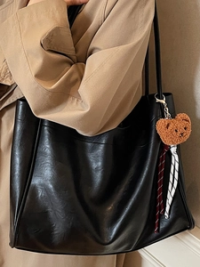Vintage black tote bag for women with large capacity and a cute plush bear charm
