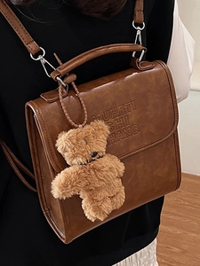 Vintage brown PU leather backpack with letter embossing and cute plush bear charm