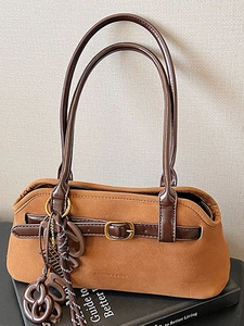 Retro caramel brown suede tote bag with leather straps and chain charm accessory