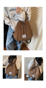 Detail of dark brown canvas backpack featuring drawstring closure and premium side pockets