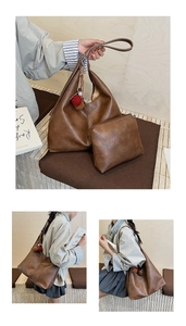 Brown vintage faux leather bucket bag set with plush ball pendant and matching inner pouch