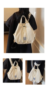 Detail view of large capacity beige canvas drawstring backpack with side pockets