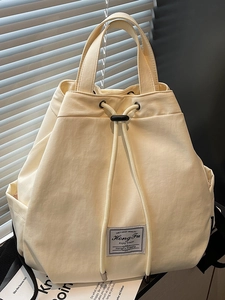 Urban Minimalist Women Canvas Drawstring Backpack Fashion Large Capacity Travel Bucket Bag With Stitching Details Shoulder Bag