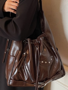 Vintage dark brown large capacity bucket bag with silver studs and tassel detail