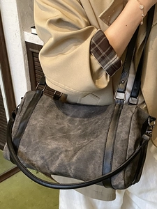 Vintage canvas Boston bag in washed dark grey with black leather straps and metal rings