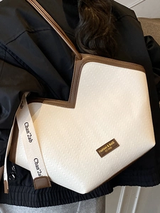 Retro high-capacity tote bag with V-shaped opening and white herringbone texture