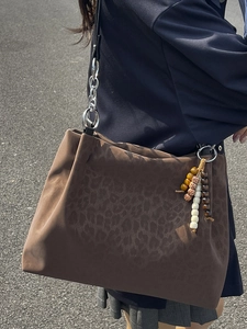 Brown leopard print tote bag with suede texture and chain strap for women