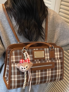 Classic brown plaid tote bag for women featuring a stylish shoulder strap and hand carry design
