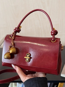 Retro burgundy patent leather handbag with gold twist lock and tassel for women