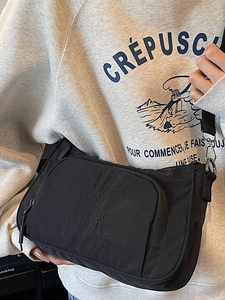 Vintage black nylon crossbody chest bag with adjustable strap and BIFW embroidery details