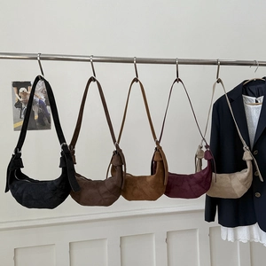 Detailed comparison of hobo croissant bags in five colors with side knot details