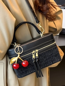 Women's black tweed patchwork handbag with gold hardware and red cherry charms
