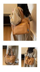 Detail view of khaki multi-pocket tote bag showing shoulder, hand-carry, and crossbody styles