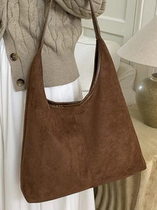 Minimalist brown suede hobo tote bag for women featuring vintage shoulder strap design