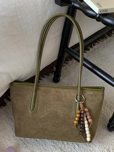 Chic olive green faux suede tote bag with stylish beaded tassel for autumn daily commute