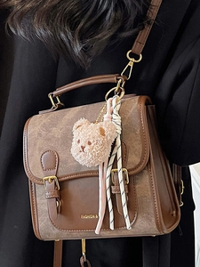 Sac à dos en cuir marron rétro avec poignée et pendentif ours pour femmes