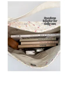 Top view of floral tote bag interior showing spacious capacity and magnetic buckle closure