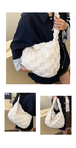 Detail view of white plush tote bag featuring a textured checkerboard embossed pattern