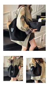 Détail du grand sac cabas noir en suédine avec pochette zippée assortie de luxe