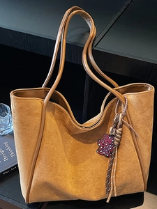 Retro caramel tote bag in matte suede with brown leather trim and leopard bear charm