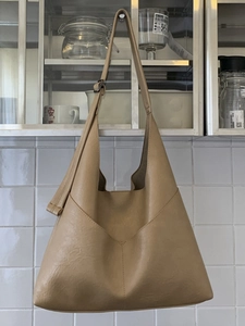 Retro brown leather tote bag with V-shaped stitching and adjustable strap for women