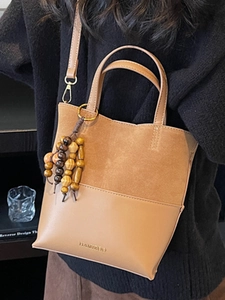 Brown retro tote bag in mixed leather and suede with wooden beads and strap