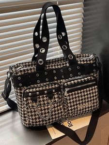 Houndstooth punk tote bag with silver eyelet straps and metal chain detail
