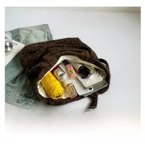 Top view of spacious brown plush tote bag showing large capacity for daily items