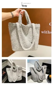 Detail view of shaggy grey plush tote bag with short handles and shoulder strap