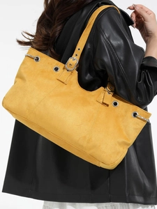Retro yellow suede tote bag with metal eyelets and adjustable strap for women