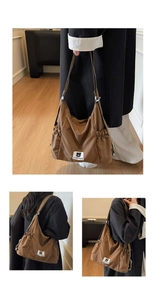Detail view of coffee canvas tote bag with side drawstring pocket and brand logo tag
