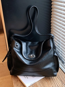 Retro black oversized oil wax leather tote bag with silver turn-lock and reinforced corners