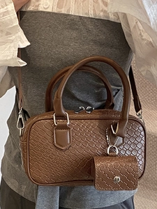 Brown woven texture Boston bag for women with mini pendant and adjustable strap
