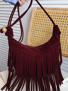 Retro burgundy suede tassel hobo bag for women with bohemian wooden bead shoulder strap