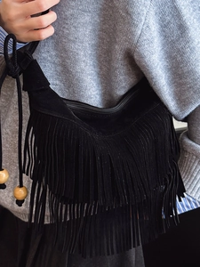 Chic black tassel crossbody bag with wooden beads and faux suede matte finish