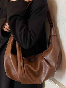 Vintage brown leather hobo bag with large capacity and minimalist design for women