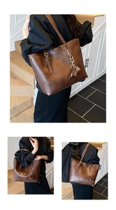 Brown vintage faux leather tote bag with pebble texture and cute elephant pendant detail