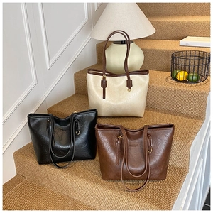 Three vintage PU leather tote bags in off-white, black, and brown for daily commuting