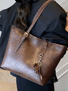 Retro brown large capacity leather tote bag with adjustable straps and bow charm