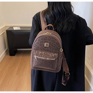 Rear view of a stylish leopard print backpack with high-capacity design for women