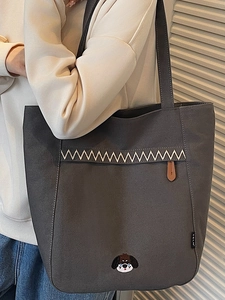 Sac seau en toile gris foncé minimaliste avec broderie en zigzag et patch de chien