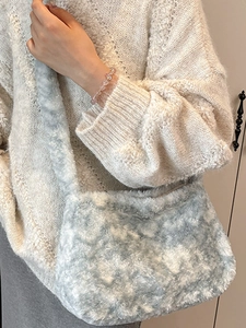 Fashionable light blue plush bucket bag with soft faux fur texture for women's daily commute