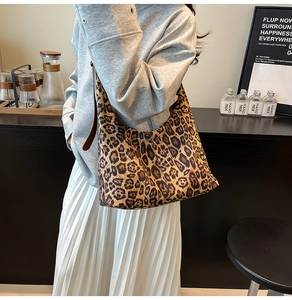 Close-up of leopard print tote bag fabric texture and spacious interior for daily use