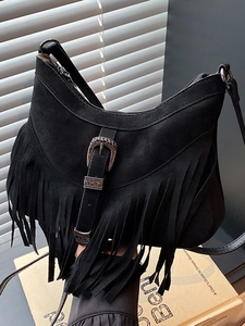 Retro black suede hobo shoulder bag with long fringes and vintage metal buckle detail