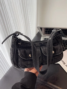Vintage black denim motorcycle shoulder bag with multi-pockets and metal hardware