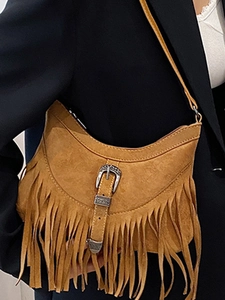Caramel faux suede half-moon crossbody bag with long fringes and vintage metal buckle