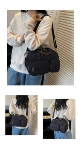 Détail du sac bandoulière en nylon noir avec design multi-poches et poignées en cuir