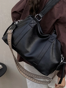 Chic black large capacity tote bag with adjustable geometric pattern shoulder strap for women