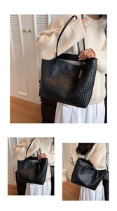 Close-up of the black woven texture and large capacity design of this retro tote bag