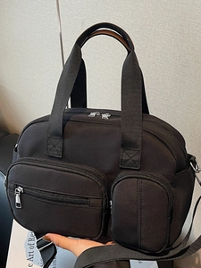 Fashionable black nylon multi-pocket tote bag with adjustable shoulder straps